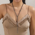 Detailed view of vintage Y-shaped long necklace with grey metallic beads on a model - Retro Round Beads (7017)