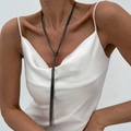 Minimalist Y-shaped multi-layer gunmetal tassel necklace on a model wearing white silk - Three-Layer Knotted Tassel Style (7116) / Gun Black (7116)