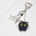 Dettaglio portachiavi gatto in acrilico con lisca di pesce e chiusura a cuore - Stile Gatto Nero Lisca di Pesce Stella (0279)