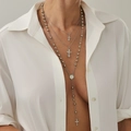 Λεπτομέρεια από ασημένια κολιέ με σταυρούς, πέρλες και θρησκευτικό μενταγιόν Παναγία - Σετ Ασημί Πολυεπίπεδο Κολιέ Σταυρός Μετάλλιο Αγίας Εικόνας (6601) / Ασημί