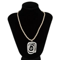 Minimalist silver geometric spiral necklace on a black velvet display stand - Rectangle Spiral Style (7229K1) / Silver