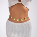 Gold bohemian shell waist chain with turquoise accents on a model for beach style - Gold Scallop Style (1781)