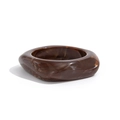 Macro shot of dark brown tortoiseshell resin bangle with irregular marbled textures - Dark Brown
