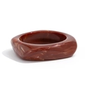 Macro view of retro faux tortoise shell resin bracelet showing deep amber marble texture - Irregular Square-Round Marble Bangle / Red Brown