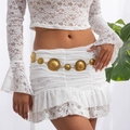 Vintage gold embossed circle chain belt styled on a white lace skirt with a floral pattern - Heart And Oval Patchwork Style (1861) / Antique Gold