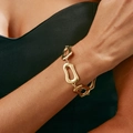 Close-up of a gold hollow geometric link necklace worn by a model on a black top - Gold Irregular Geometric Hollow Link Bracelet (3021)