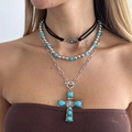 Close-up of Bohemian layered necklaces with turquoise beads and a large silver cross pendant - Large Textured Cross Style (6832)