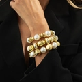 Three-piece layered bracelet set with white pearls and gold hammered metal beads - Gold Style (6893)