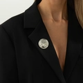 Silver round liquid-metal ripple brooch with irregular hammered texture on black lapel - Irregular Round Hammered (0323) / Silver