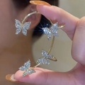 Sparkling butterfly ear cuff with silver crystals in a gold-plated wrap design - Gold (Left Ear)