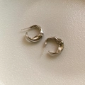 Irregular silver C-shaped lava hoop earrings with a minimalist molten metal texture finish - Silver
