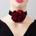 Oversized burgundy fabric flower choker with black velvet ribbon on a fashion model - Choker Necklace / Burgundy