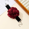 Detail of dark red velvet rose choker with elegant fabric petals and silver metal clasp - Wrist Corsage / Burgundy
