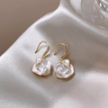Elegant white camellia drop earrings with gold edges on champagne silk background - Milky White Camellia Shape Gold Edging (29#)