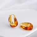 Close-up of vintage French U-shaped amber resin earrings with polished gold accents - Style A Amber (18K Gold Plated)