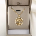 Detailed close-up of hollow Tree of Life gold necklace with sparkling crystals in a gift box - Bright Gold Round Tree of Life Style (XL1138-Gold)