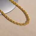 Chunky 8mm 18K gold-plated stainless steel rope chain necklace for women on beige background - Necklace / Gold
