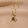 Golden planet pendant necklace with blue sphere and sparkling stones on beige fabric - Blue Black Planet Style(224B)