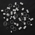 80er Set silberner Dreadlock-Schmuck mit hohlen Haarringen und Manschetten auf Schwarz - Silber