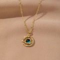 Macro shot of gold planet necklace featuring blue nebula stone and sparkling crystals - Planet Saturn Style(224)