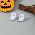 Detail of cute white ghost earrings with black facial features for Halloween style - White Ghost Stud Earrings