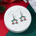 Detail of star-shaped Christmas earrings with Santa Claus motif on a festive background - Star Santa Style (5)
