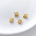 Detailed macro view of four hollow square golden charms with traditional beast carvings - Beast Face Pattern Hollow Square (5#) / 1 Piece (6x7mm)