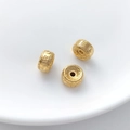 Macro shot of three gold lotus beads with Buddhist engravings for DIY jewelry making - Ruyi Pattern Frosted Drum Bead (12#) / 1 Piece (10x5.5mm)