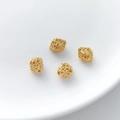 Detailed view of four golden filigree hollow beads for DIY jewelry making and crafts - Filigree Hollow Woven Style (13#) / 1 Piece (7.5x9mm)