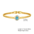 Detail view of gold Cuban chain bracelet with blue zircon and 17.5cm length markings - Blue Oval Rhinestone Style (123GL)