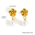 Detailed view of vintage gold rose earrings with white pearls and product dimensions - Gold