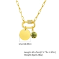 Detail of gold paperclip necklace with emerald pendant and engravable 1.5cm round disk - August Olive Green Zirconia
