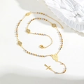 Detailed macro view of tricolor rosary beads and religious crucifix on gold necklace - Virgin Mary Medal Cross Necklace (NC-2346G02)