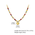 Close-up of colorful beaded necklace with gold heart pendant and size specifications - Colorful Beaded Heart Necklace (NC-2372G04)