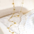 Collana vintage francese in acciaio al titanio placcato oro 18 carati con perle dorate - Catena con Perline e Nappine (UK04)