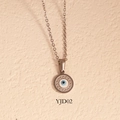 Silver Evil Eye necklace with blue concentric circle pendant and bead texture detail - Round Evil Eye Style (YJD02) / Necklace / Silver