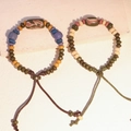 Bracciale etnico in ceramica con corda regolabile e design vintage a osso d'oracolo - MU03