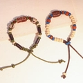 Set di bracciali etnici in ceramica con perline, motivi oracle e cordino cerato oliva - MU08