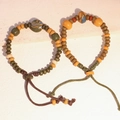 Bracciali etnici in perle di ceramica toni della terra con cordino regolabile - MU12
