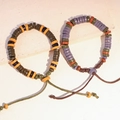 Bracciale etnico in rilievo in ceramica con design di ossa oracolari e cordino regolabile - MU16