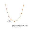 Detail van 40+5cm gouden ketting met gekleurde kralen van 0,4cm op witte achtergrond - Veelkleurige Gekleurde Steen (NC-2508G)