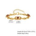 Detail van amberkleurige harskralen op 18K goudvergulde stalen ketting met afmetingen - Armband (BR-2676G)