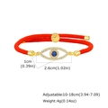 Macro detail of Tree of Life and Evil Eye pendant on adjustable red cord bracelet - Red (PBR-288G02)