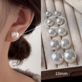 Elegantes pendientes de perlas blancas de 10mm en joyero y lucidos por modelo - US 10 / Blanco