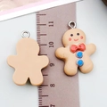 Brown resin gingerbread man pendant for DIY jewelry with silver metal ring - Brown Gingerbread Man (19711)