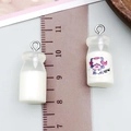 Miniature resin white milk bottle charm with cartoon cow sticker and metal ring - Transparent Milk Feeding Bottle (24095)