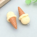 Resin ice cream cone pendants with realistic waffle texture and silver hanging loops - Yellow Resin Ice Cream Cone (23825)