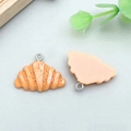Miniature resin croissant charm with realistic texture and silver ring for DIY jewelry - Yellow Resin Croissant (24638)
