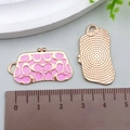 Detailed macro view showing pink enamel handbag charms with gold metal grid texture back - Pink Enamel Handbag 30*17mm (22896)