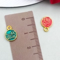 Red and teal enamel 'Fu' bag charms with gold-plated alloy frames for DIY jewelry - Red and Green Ruyi Fu Character (22800)